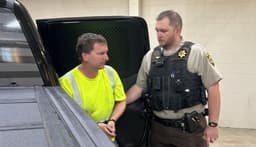 Husband Arrested After Woman Found Dead Along Roadway