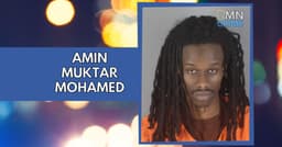 Man Charged After Gun Discharged During Fight on I-35W