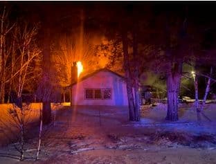 Man Jumps to Safety From Burning Home Near Cook